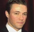 McEwen Mining (TSE:MUX) Senior Vice President Ian Ball